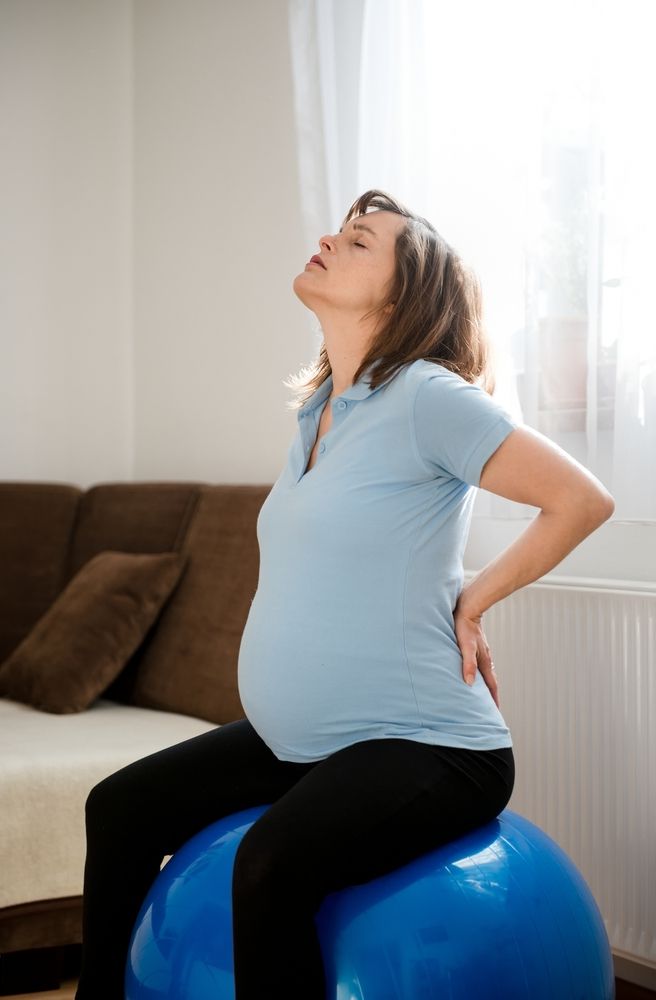У беременной болит спина, что делать